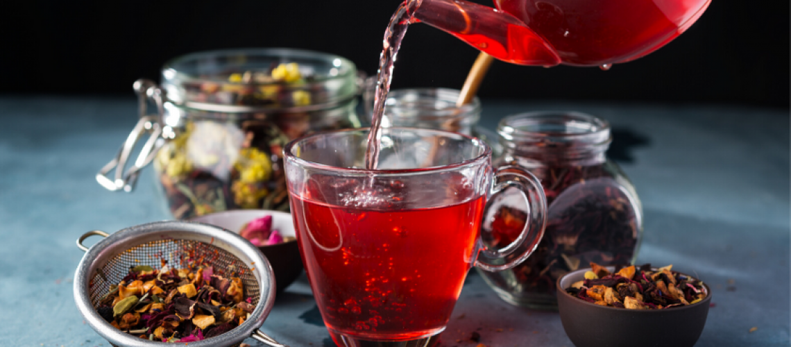 Pouring-red-raspberry-herbal-tea